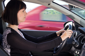 Fototapeta na wymiar Woman driving car