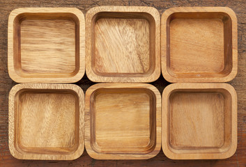 six square wooden bowls