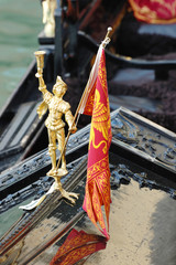 Naklejka premium Beautiful golden gondola decoration, Venice, Italy