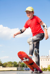 little girl -  skateboarder