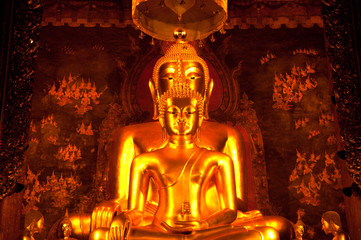 Fototapeta premium Big sitting golden buddha in church ,Bangkok in Thailand..