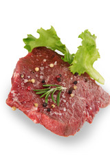 Raw beef steak on a white background 