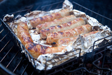 sausages on  grill