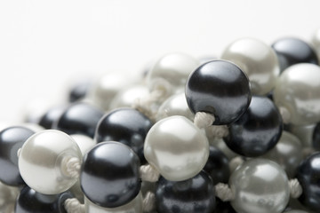 String of black and white pearls