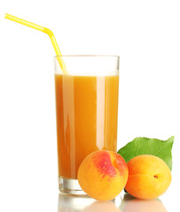glass of apricot juice and apricots with leaf isolated on white