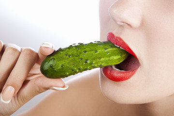 Sexy girl with cucumber