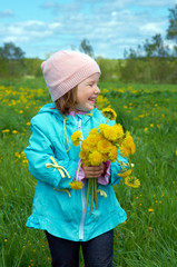 small girl  on meadow