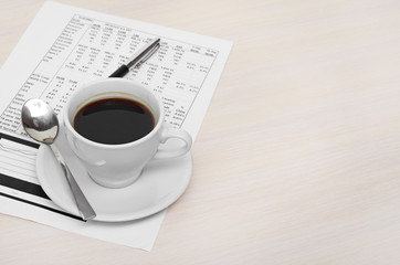 Accounting. Cup of coffee on document. chart and diagram