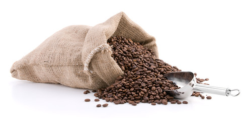 Burlap sack full of coffee beans with metal scoop