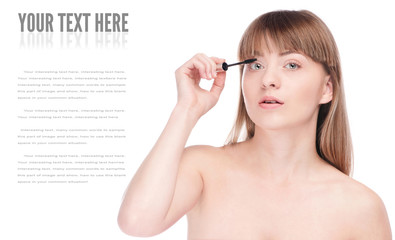 Fototapeta premium Beautiful woman with make up brush
