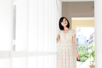 Beautiful young woman relaxing in the room