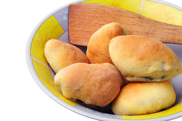 Pies in yellow plate
