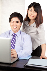 Obraz premium Businessman and Businesswoman at Work