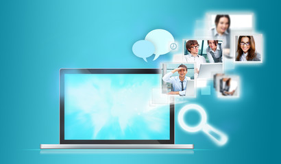 Opened laptop with european flags flying from the screen