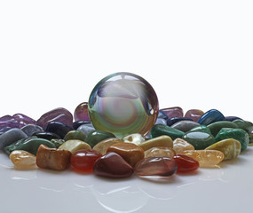 Crystal ball and healing gem stones