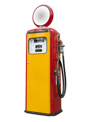 antique gas pump in yellow and red, isolated