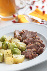 Goose breast with vegetables and beer