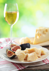 Cheeses, figs, and wine