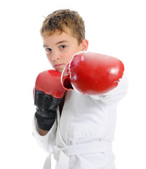 Young boy training karate. - 42507640