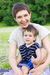 Young mother with son outdoor