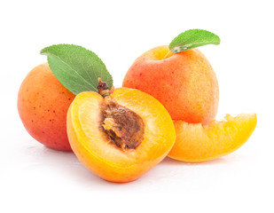 Set apricot with green leaf and cut isolated on white