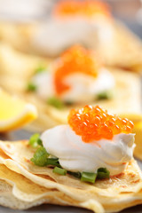 Crepes with caviar