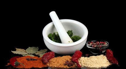 Composition of White mortar and pestle with spice and