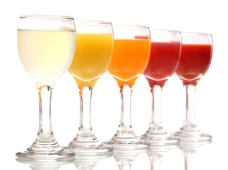 Tropical juices in glasses isolated on white