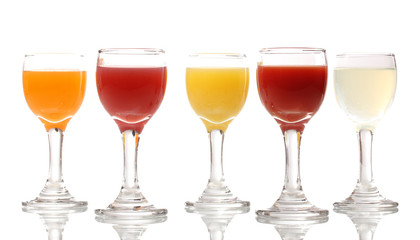 Tropical juices in glasses isolated on white