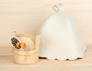 Sauna hat bathroom set on wooden background