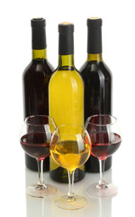bottles and glasses of wine isolated on white