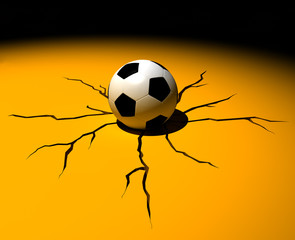Balón de fútbol rajando el suelo