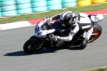 Fototapeten Motorrad auf der Rennstrecke © Lario Tus