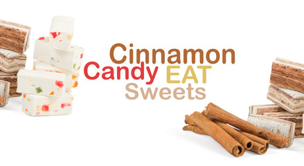 Sweets and cinnamon sticks isolated on white background