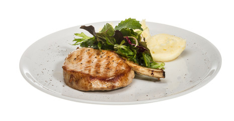 Grilled pork with salad and potato