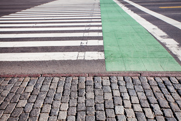 crosswalk, bicycle lane and pavement