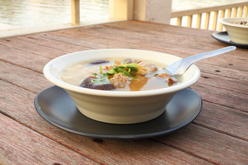 Pork and mushroom congee on morning breakfast.