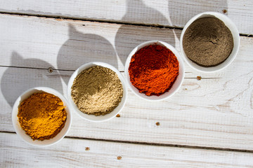 Presented a variety of spices on the old board