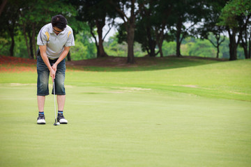 Putting on golf course