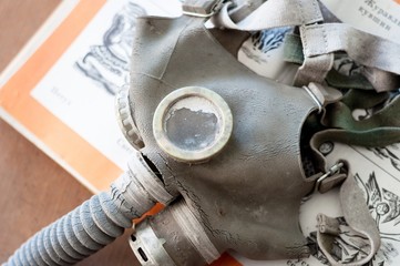Gasmask on a book for children