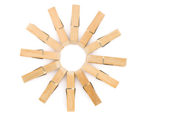 clothespins line up in circle with clipping path