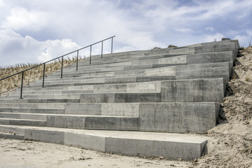 Fototapeta na wymiar concrete stairs at the beach