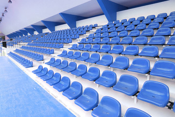 Fototapeta premium Blue seat at Thep Hasadin Stadium in Thailand