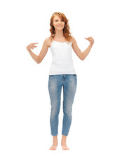 Fototapeta premium smiling teenage girl in blank white t-shirt