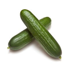 Mini Cucumbers isolated on a white studio background.
