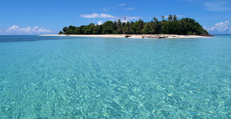 Pristine island with lush vegetation and a lagoon with turquoise water, Caribbean sea, Panama,...