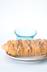 Hot dogs wrapped in crescent rolls with cheese and chicken in pl