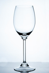 Empty wine glass on a white background.