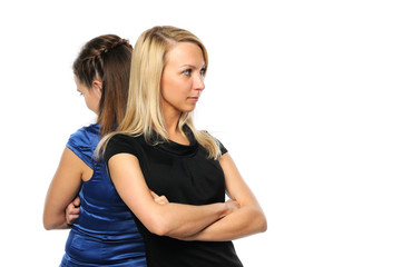 Two young attractive women standing