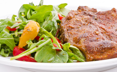 cervical chop with apricot-rocket salad